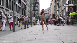 Kira Walks Completely Nude In A German Town