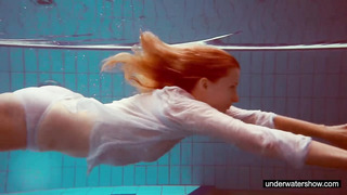 Cute Redhead Plays Naked Underwater