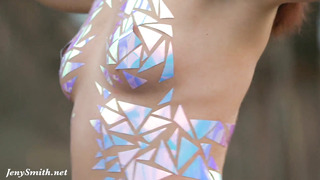 Beautiful woman's photosession with sticky tape instead of any clothes. Really hot video